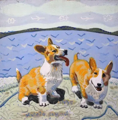 Две собаки корги у моря